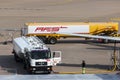 Kerosene fuel trucks tanking an airplane at cologne bonn airport germany Royalty Free Stock Photo