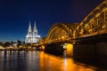 Cologne skyline with Cologne Cathedral and Hohenzollern bridge at night Royalty Free Stock Photo