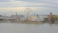 City of Cologne along river Rhine under a cloudy morning sky