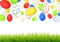 Cololrful Easter eggs falling at green grass