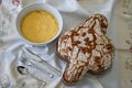 Colomba di Pasqua. Dove Cake with Italian Crema Pasticciera, Custard, in a bowl. Easter dessert traditional in Italy