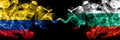 Colombia, Colombian vs Bulgaria, Bulgarian smoky mystic flags placed side by side. Thick colored silky abstract smokes flags