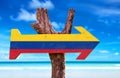 Colombia Flag sign with a beach on background