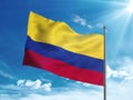 Colombia flag waving in the blue sky Royalty Free Stock Photo