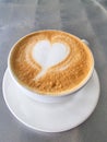 Colombia, Medellin, cup with cappuccino with heart shaped milk foam