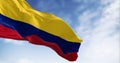 Colombia national flag waving in the wind on a clear day Royalty Free Stock Photo