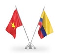 Colombia and Vietnam table flags isolated on white 3D rendering