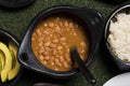 Colombian black clay pot with red bean soup, medellin dish