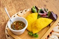 A Colombian empanada served with Pico de Gallo landscape