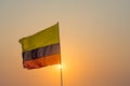 Colombian flag waving with sunset
