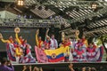 Colombian folk dancers with their national flag