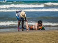 Colombian Girl Giving a Massage at the Beach