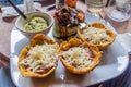 Colombian meal. Patacones (fried plantains) with beans and chees