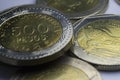 500 Colombian pesos coins. Macro of coins composition.