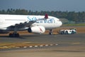 Towing an aircraft Airbus A330-300 of SriLankan Airlines Royalty Free Stock Photo