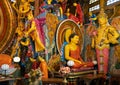 Colombo, Sri Lanka: Gangaramaya Buddhist temple interior with Buddha statue