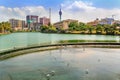 Pelicans swim in Lake Beira located in the central part of the city