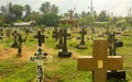 Colombo, Sri Lanka- 01 October 2018: Sri Lankan cemetery with a cross gravestone