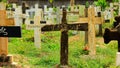 Colombo, Sri Lanka- 01 October 2018: Sri Lankan cemetery with a cross gravestone