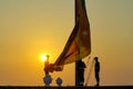 Colombo, Srilanka- 11 December 2019: Srilankan soldiers raising national flag in the Galle face beach