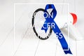 Colon cancer awareness poster. Blue ribbon made of dots on white background. Medical concept. Royalty Free Stock Photo