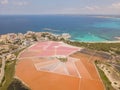 Colonia Sant Jordi, Mallorca Spain. Amazing drone aerial landscape of the pink salt flats and the charming beach Estanys Royalty Free Stock Photo