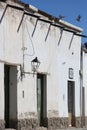 Colonial architecture in Cachi, blue sky and birds. Argentina Royalty Free Stock Photo