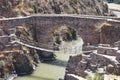 Colonial bridges spanning the river in Checacupe, Cusco, Peru Royalty Free Stock Photo