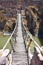 Colonial bridges spanning the river in Checacupe, Cusco, Peru Royalty Free Stock Photo