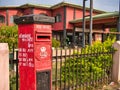 A colonial British red post box from the reign of George 6th (1936 - 1952) outside the Post Office in Jaffna