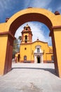 Colonial church seen through arch