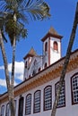 Colonial facade and towers church on the background, Serro, Brazil Royalty Free Stock Photo