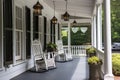 colonial house exterior with covered porch, rocking chairs, and lanterns for a welcoming atmosphere