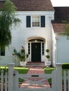 Colonial House white brick walls Royalty Free Stock Photo