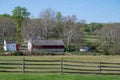 Colonial idyllic rural village scene with barn store house outbuilding Royalty Free Stock Photo