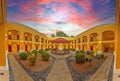 Colonial style courtyard at sunset Royalty Free Stock Photo