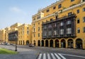 Colonial Yellow Building with Balconies in downtown Lima city near Plaza Mayor - Lima, Peru