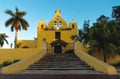 Colonial yellow church with bell tower `Santa Isabel` in Merida , Yucatan, Mexico