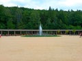 Colonnade of Luhacovice spa, fountain, people, trees and forest in the background