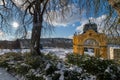 Colonnade and Singing fountain under snow - sunny winter day in Marianske Lazne (Marienbad) Royalty Free Stock Photo