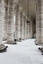 Colonnade with snow in St. Peter's Basilica. Royalty Free Stock Photo