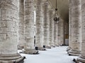 Colonnade with snow in St. Peter's Basilica. Royalty Free Stock Photo