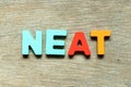Color letter in word neat on wood background