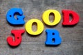 Color alphabet in word good job on wood background