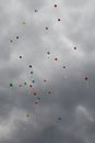 Color ballons on the grey sky
