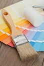 Color chart guide with brush and paint roller Royalty Free Stock Photo