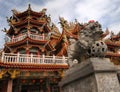 Color Chinese temple with lion stone