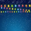 Color Christmas light bulbs on sky Royalty Free Stock Photo