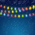 Color Christmas light bulbs on sky Royalty Free Stock Photo