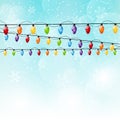 Color Christmas light bulbs on sky background Royalty Free Stock Photo